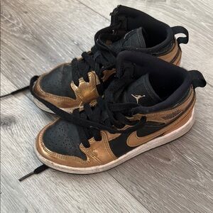 Boys Jordan Black and Gold Sneakers